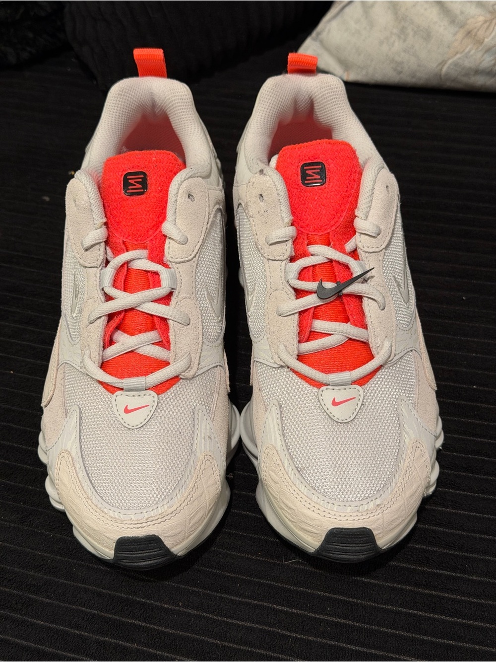 Nike Kids White Sneakers with Bright Orange Accents